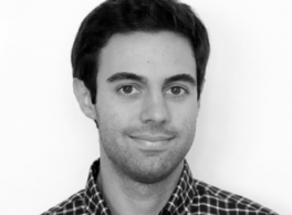 A black and white profile photo of Riccardo Pederzoli