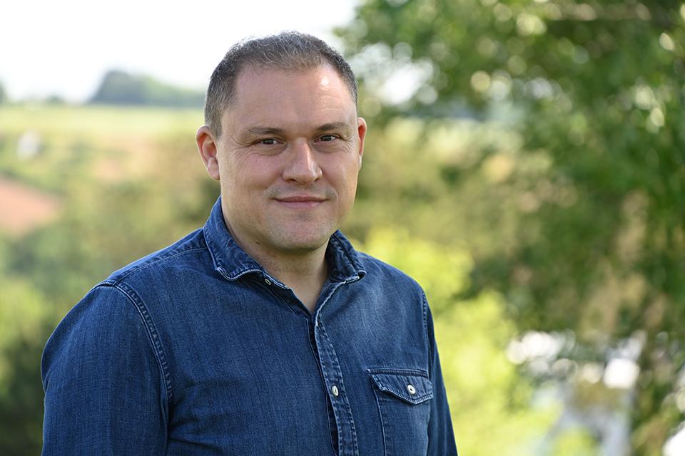 Raffaele Siano portrait photo, background fields and trees slightly blurred