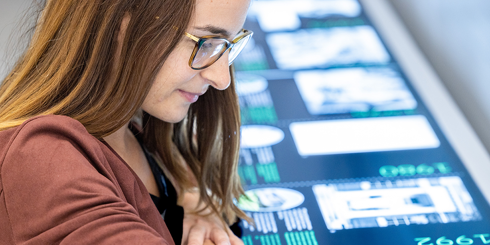 person looking at embl timeline exhibit