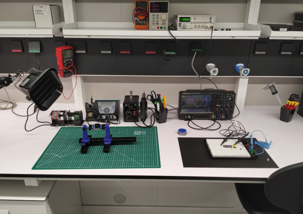 Laboratory bench with several electronics equipment