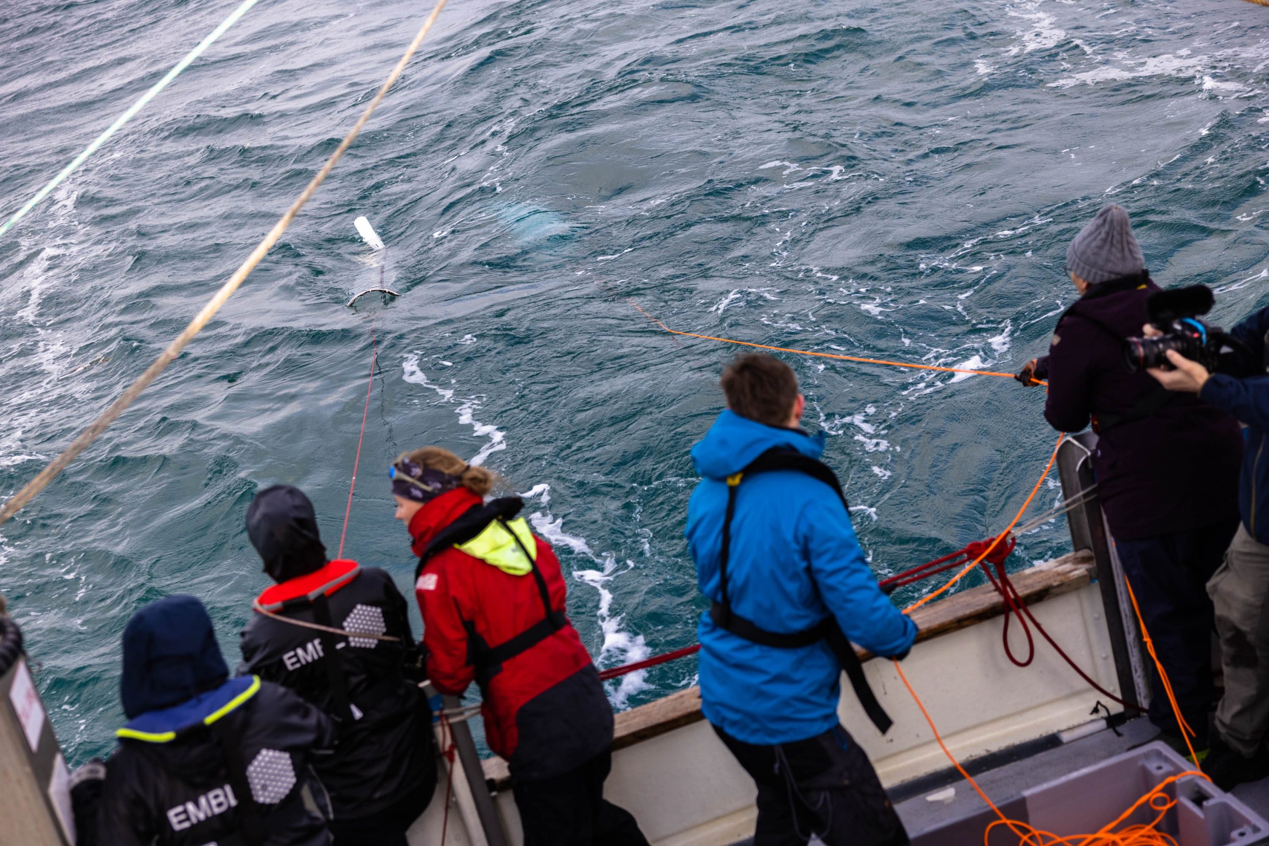 Scientists on a schooner on the ocean