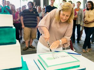 Janet Thornton cutting cake