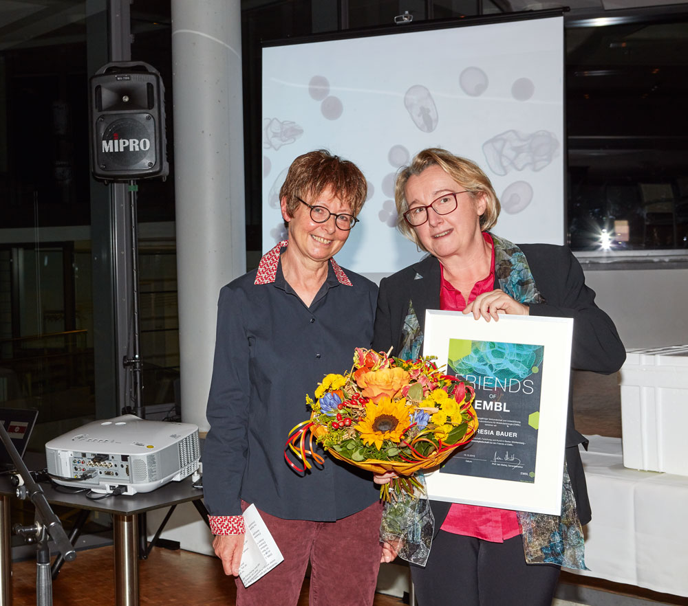 Friends in high places: A sunset rooftop soiree at EMBL Heidelberg in October was the setting to inspire conversations and connections at the first Friends of EMBL Ladies Night, where amidst a packed programme, Ailsa Mattaj, wife of EMBL Director General Iain Mattaj, presented Minister Theresia Bauer with a certificate of lifetime honorary membership. PHOTO: EMBL Photolab/Marietta Schupp