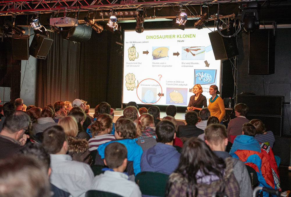 PhD Students Anna Steyer and Katharina Zirngibl explore the science behind Jurassic Park, before the film was shown to more than 200 people at the second EMBL Science Movie Night on 29 October. PHOTO: EMBL Photolab/Marietta Schupp