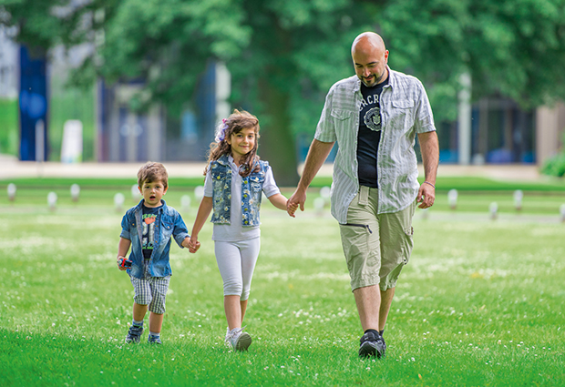 Francesco Iorio, an EMBL-EBI/Sanger Interdisciplinary Postdoc and now a senior bioinformatician at EMBL-EBI, strives to be "a great dad, as well as a great researcher". PHOTO: Robert Slowley