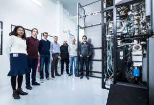 Michael Hons (second from left) and other EPN campus staff with the new microscope. PHOTO: S. Cande/ESRF