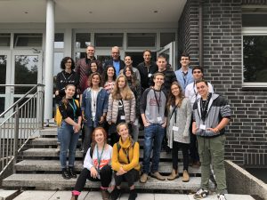 A group of young students in front of the EMBL site in Hamburg.