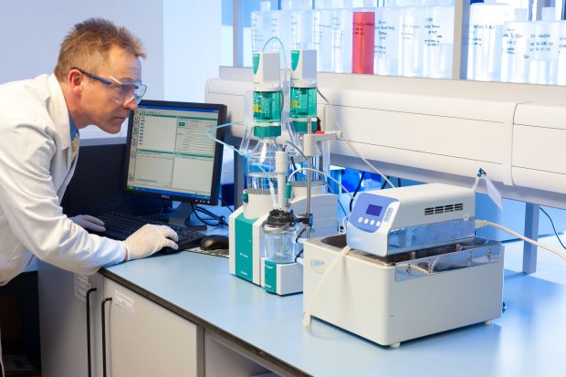 Lab technician working on enzyme