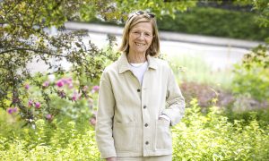 Female scientist photographed in a garden