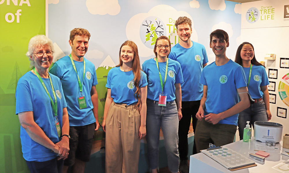 A group of people wearing Darwin Tree of Life t-shirts