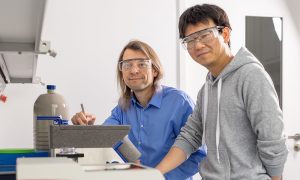 Two male scientists with safety glasses at EMBL Imaging Centre