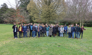 Group of 30 people on a meadow