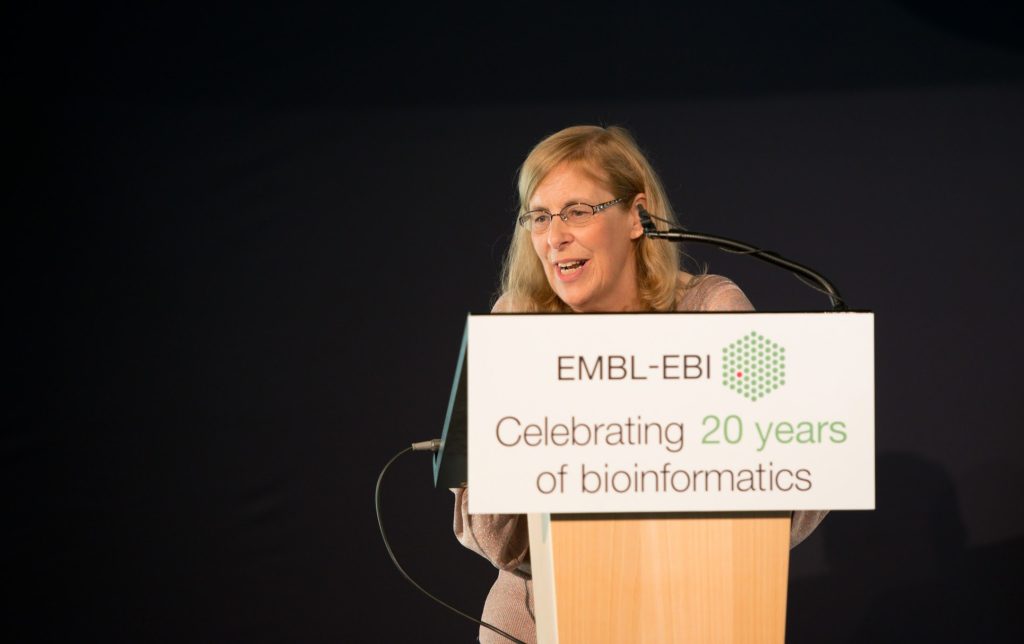 Woman standing at a podium 