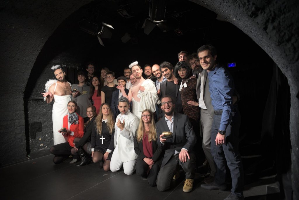 Group photo of theatre actors and workers.