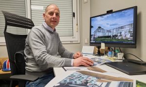 Tim Shayers sitting in his office