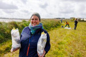 Researcher holding two sample bags..