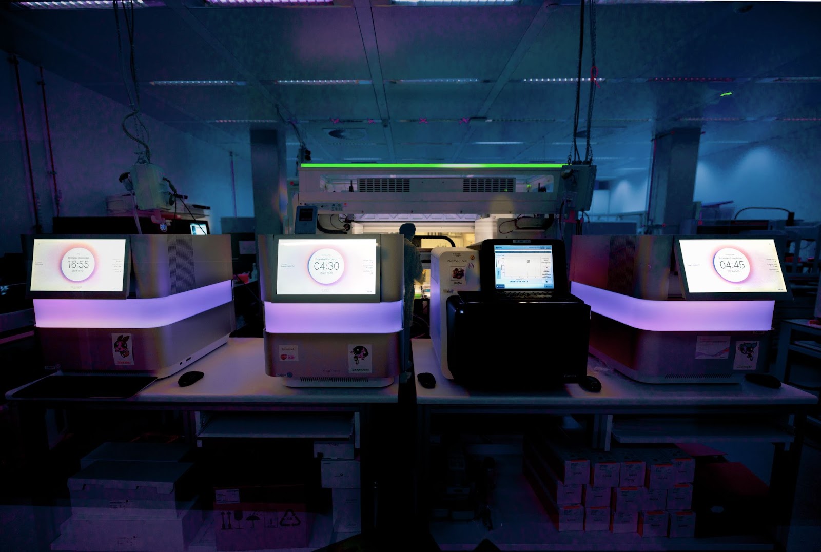 Four sequencing machines inside the GeneCore facility