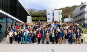 Group photo of the conference participants taken in front of the EMBL Imagine Centre in Heidelberg.