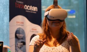 Young girl with virtual reality goggles