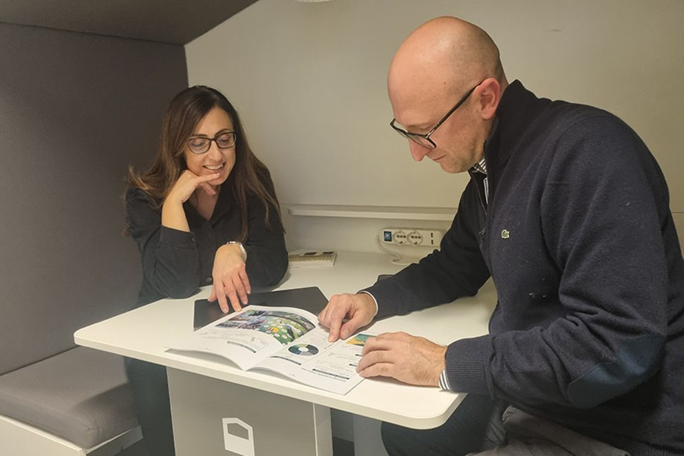 two scientists conferring