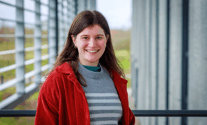 Person standing outside a building