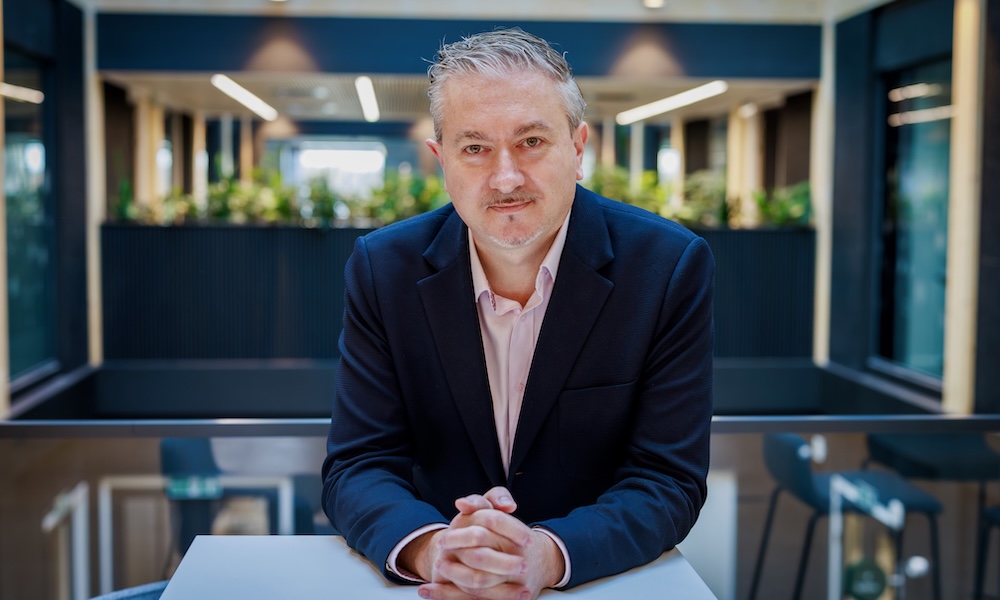 Person leaning on a table