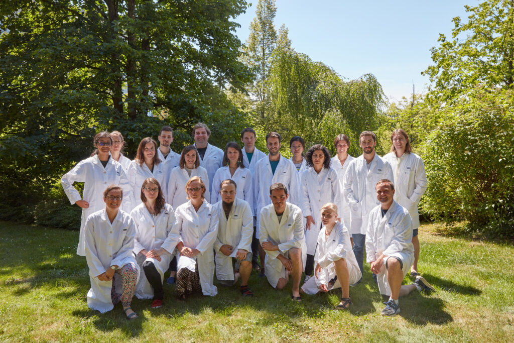 Lisa Maier poses for a group picture with the Typas Group at EMBL Heidelberg during Lab Day in 2018.